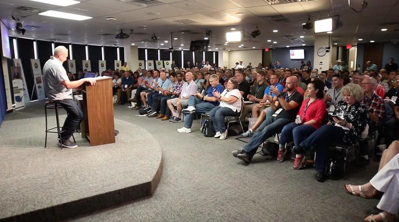 Del presenting to group